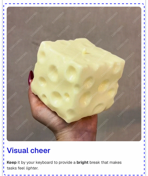 Yellow cheese held