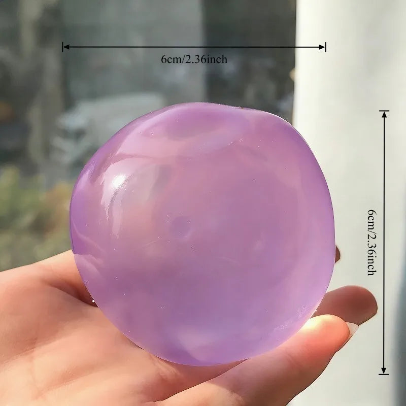 Crystal Maltose Squishy Ball squeezed to show its zero-rebound texture